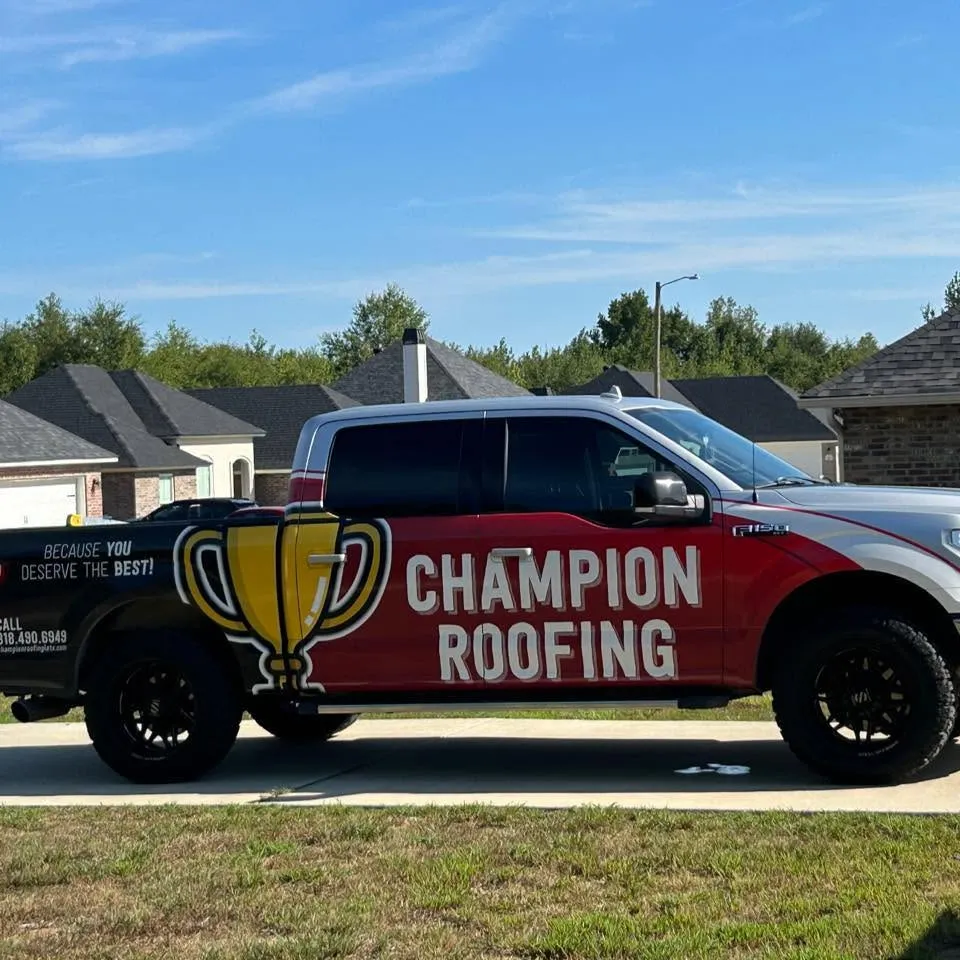 Champion Roofing branded truck in a Shreveport neighborhood